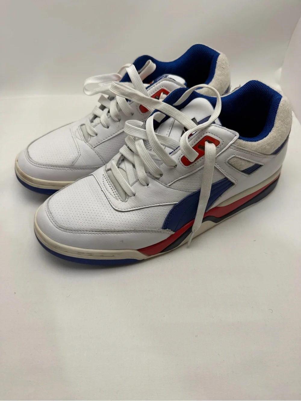Puma White Athletic Sneakers with Blue and Red Accents